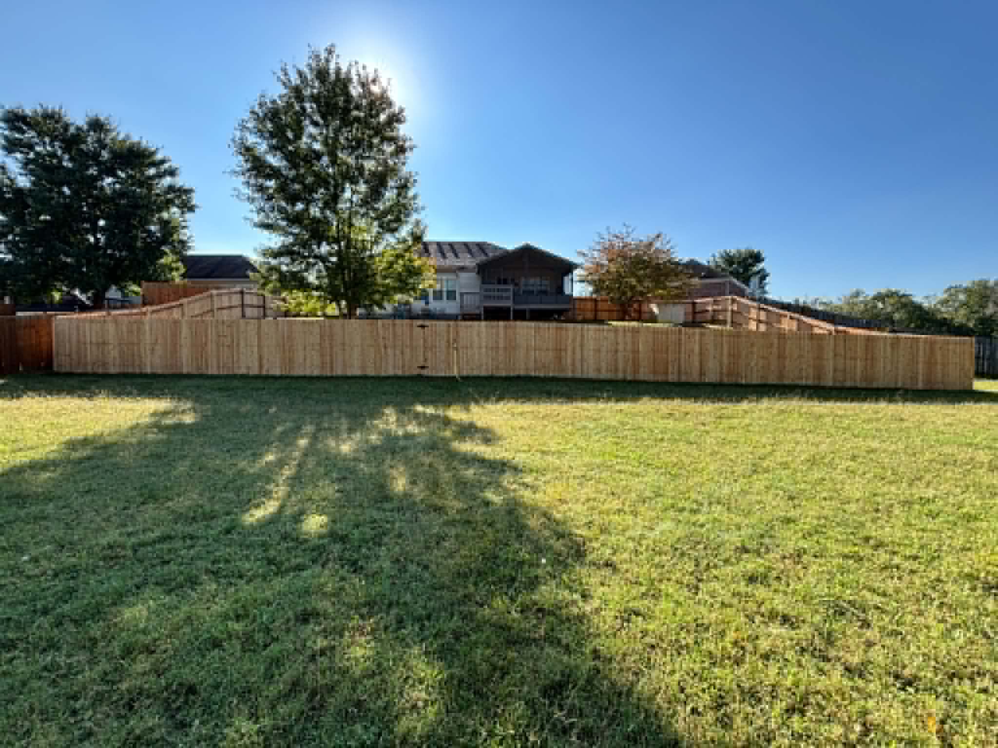 Cedar fence along long backyard in Middle Tennessee