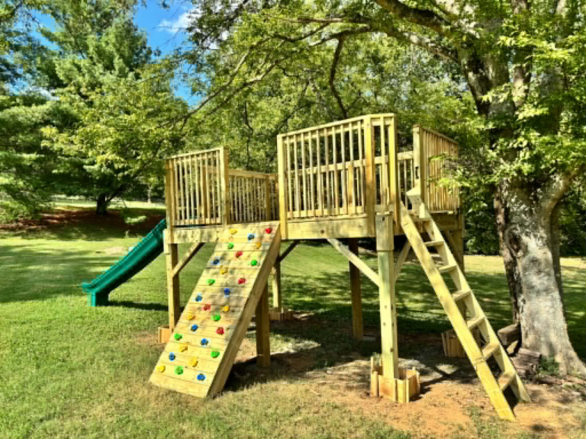 Custom backyard playset and playground structure built by Henning Construction in Middle Tennessee