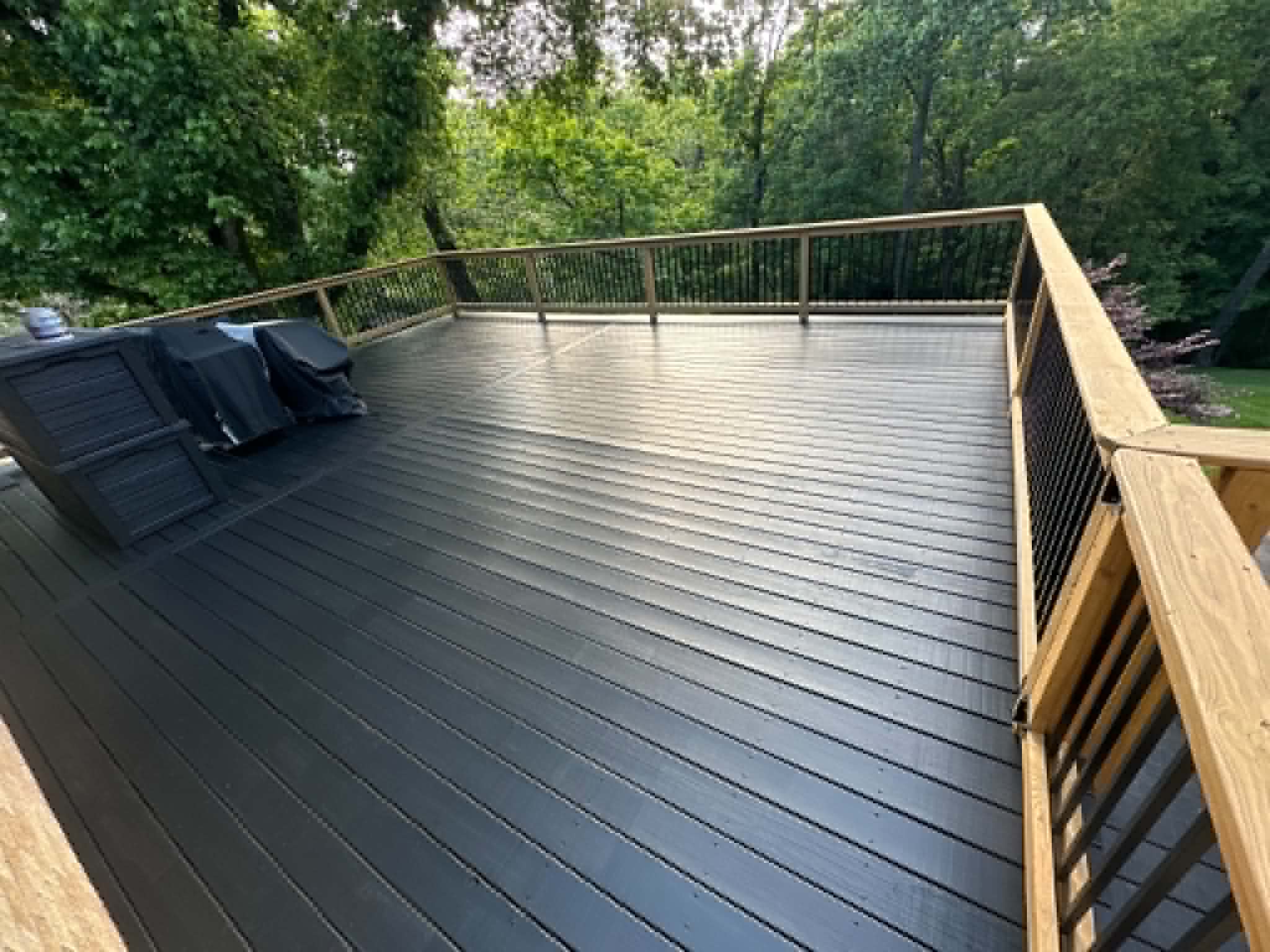 Top-down view of dark composite deck built by Henning Construction in Middle Tennessee