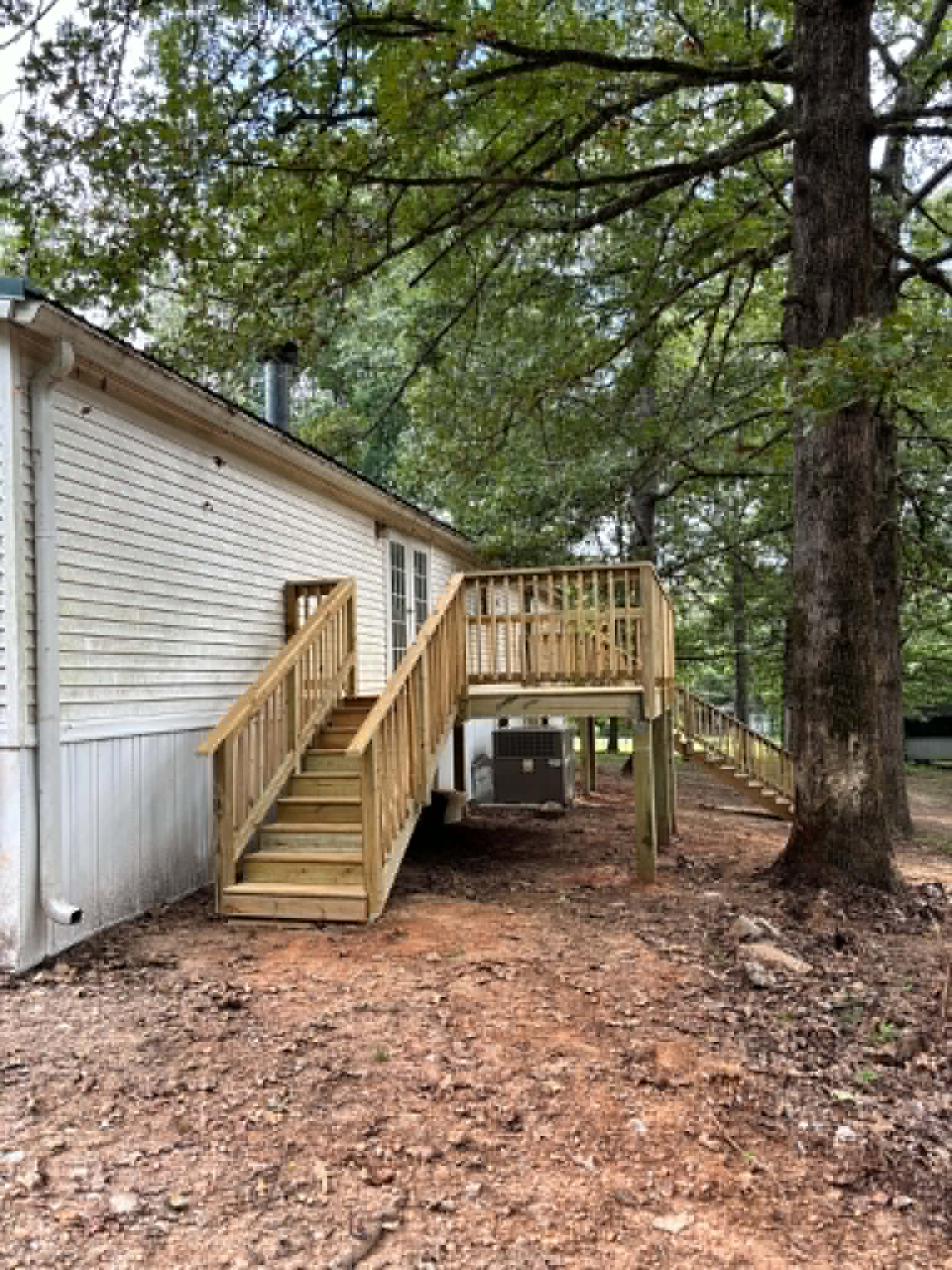 Tall elevated deck in side yard in Middle Tennessee