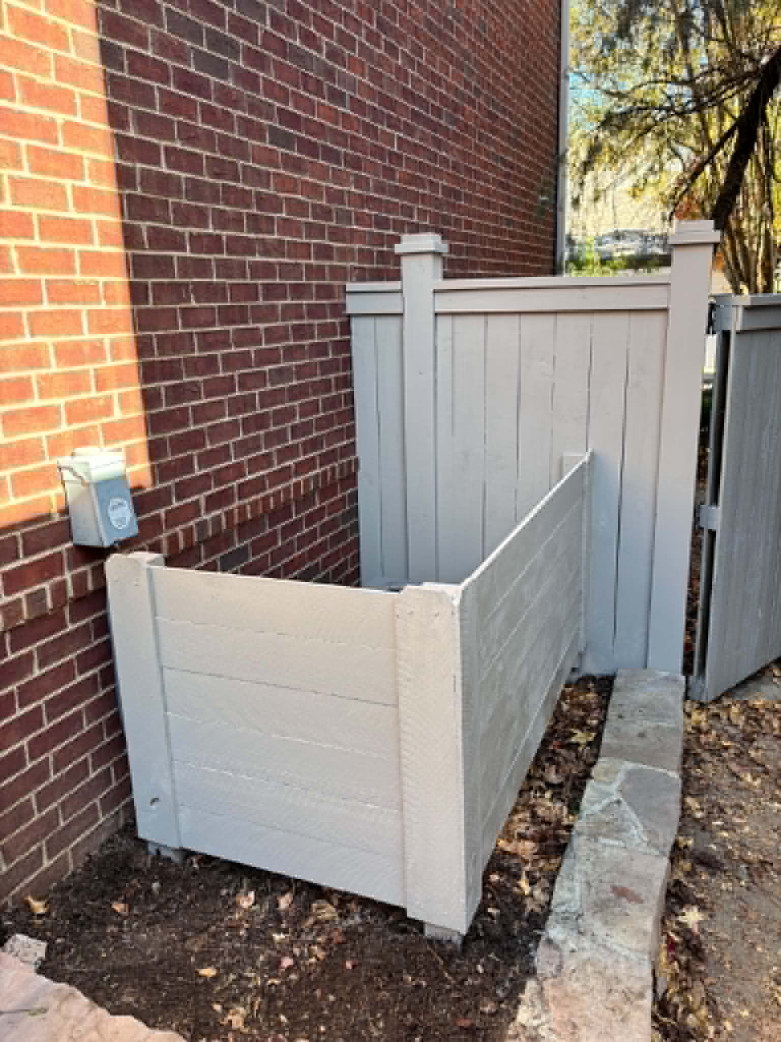 Painted custom fence installed by Henning Construction in Middle Tennessee